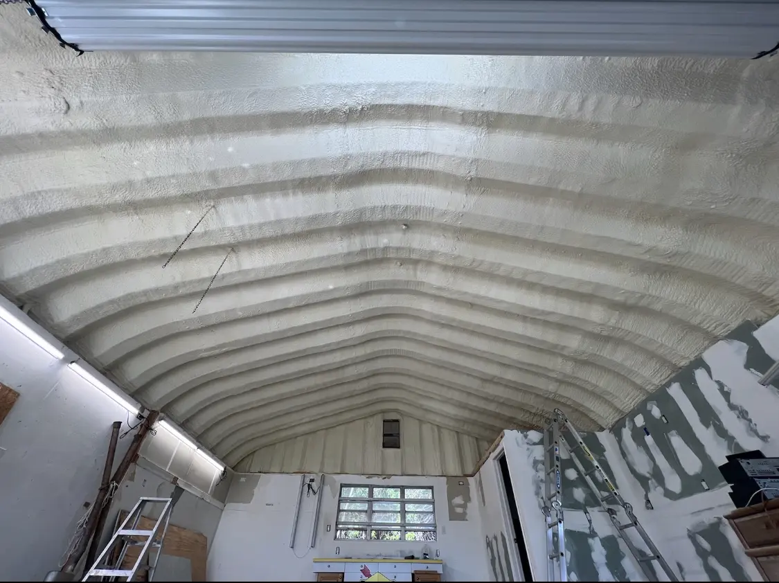 Spray polyurethane foam applied to the underside of a metal roof deck in Ridge Wood Heights